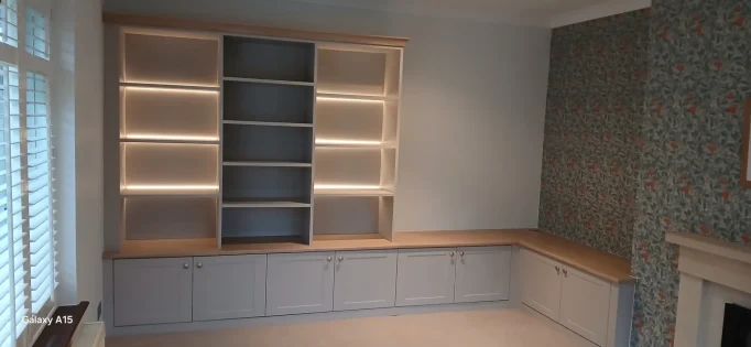 Custom wooden shelving built by Champion Carpentry.